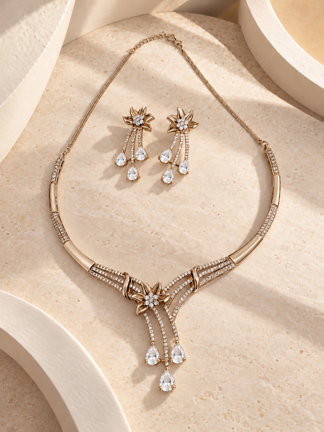 Niska floral AD stone necklace and matching earrings worn by a model