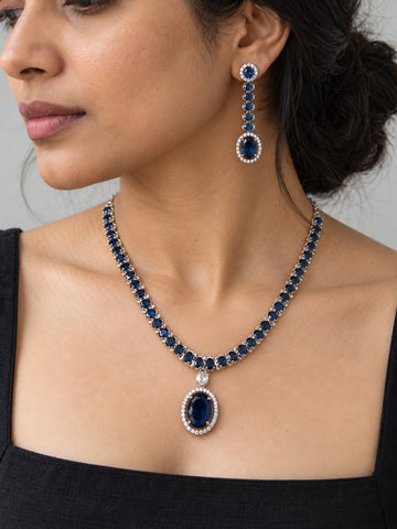 Niska navy blue AD stone silver replica necklace and earrings set on model – NE26N10482