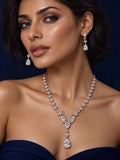 Niska pear-drop silver-tone replica necklace and earring set on model
