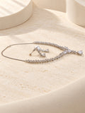Niska pear-drop silver-tone replica necklace and earring set side view