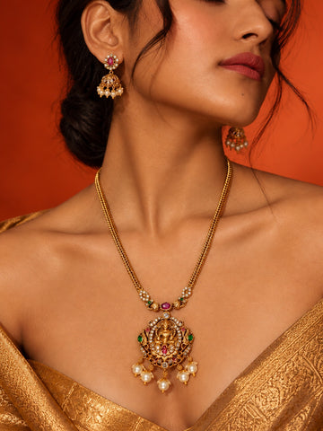 Niska gold-tone temple replica necklace set with jhumka earrings on model