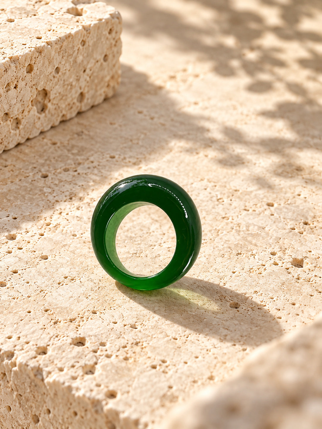 Niska green dome replica statement ring on ivory travertine, view 3