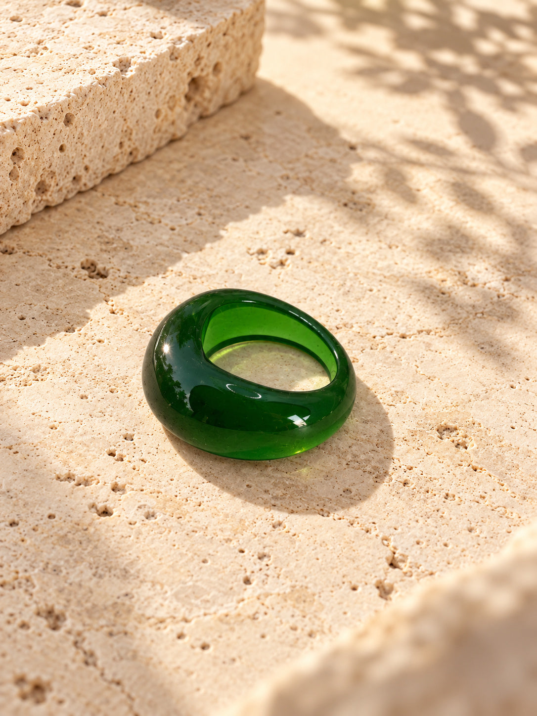 Niska green dome replica statement ring on ivory travertine, view 5