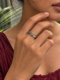 Niska silver-tone curved stone replica ring worn on model hand