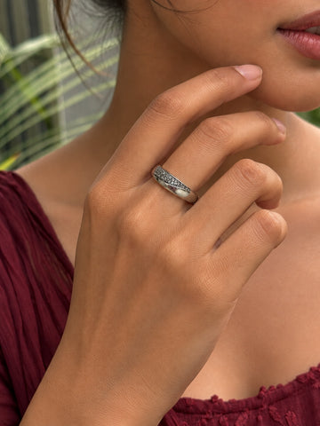 Niska silver-tone curved stone replica ring worn on model hand