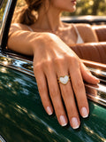 Niska white heart adjustable gold-tone ring worn by model
