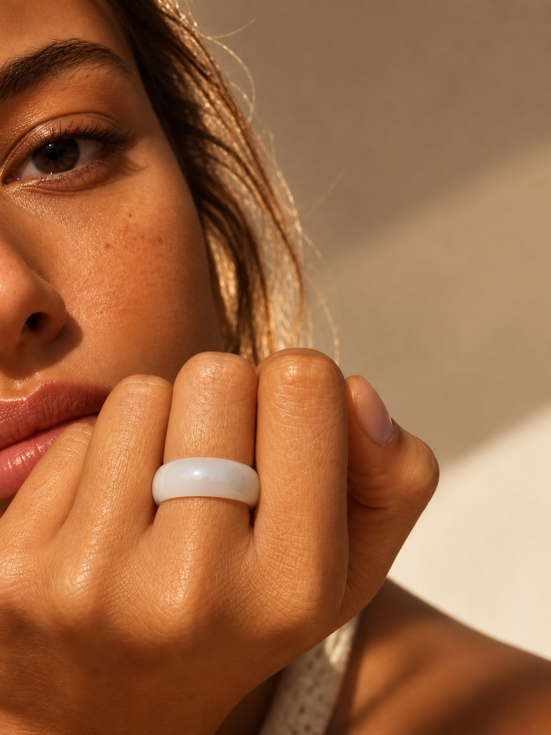 Milky White Dome Replica Ring worn on model hand view 1