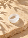 Milky White Dome Replica Ring on beige stone view 5