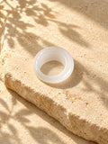 Milky White Dome Replica Ring on beige stone view 6