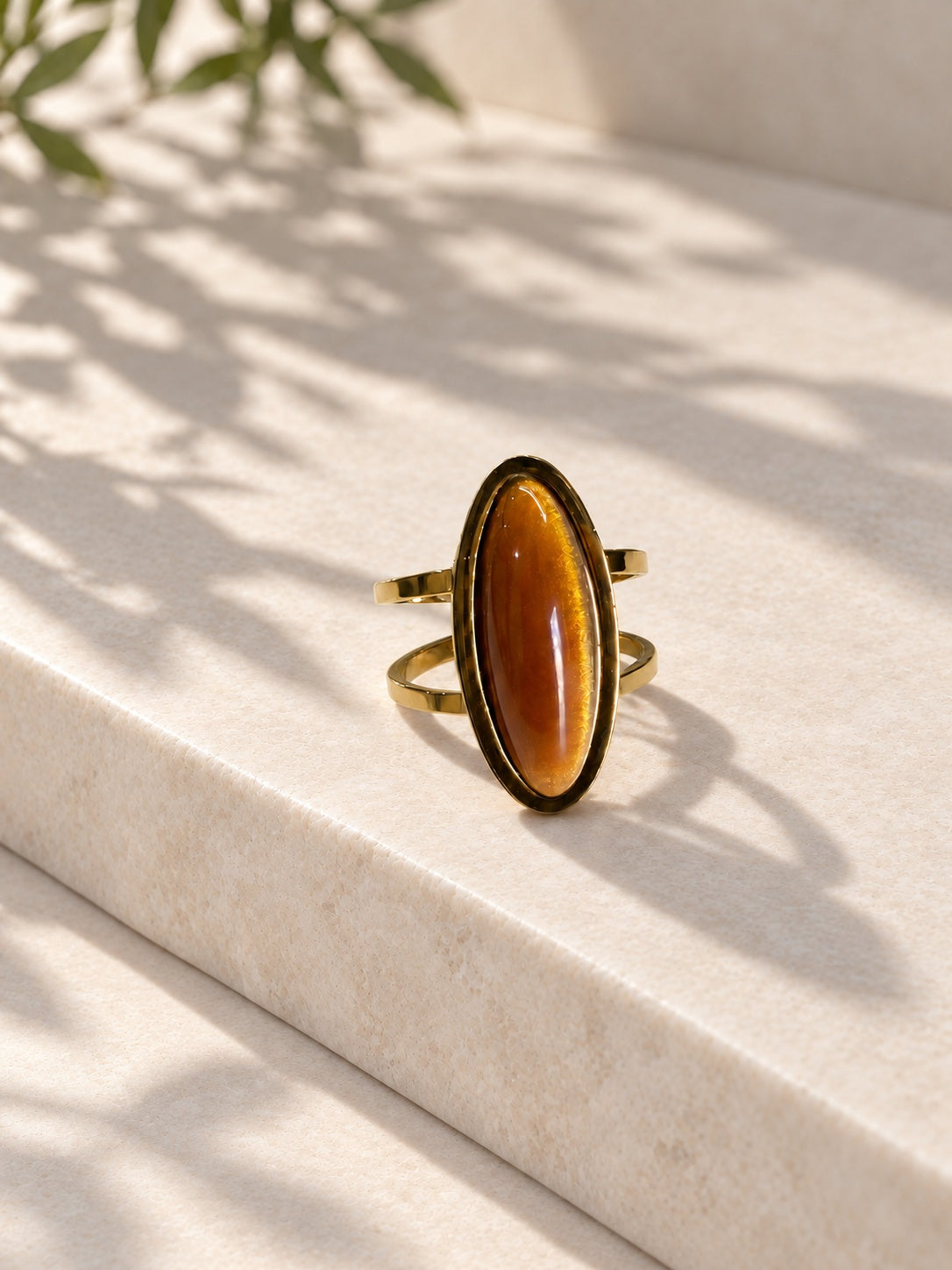 Niska honey brown oval statement ring worn on model