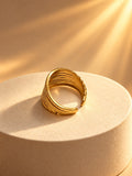 Niska Golden Wave Ribbed Statement Ring – gold-tone layered ring detail
