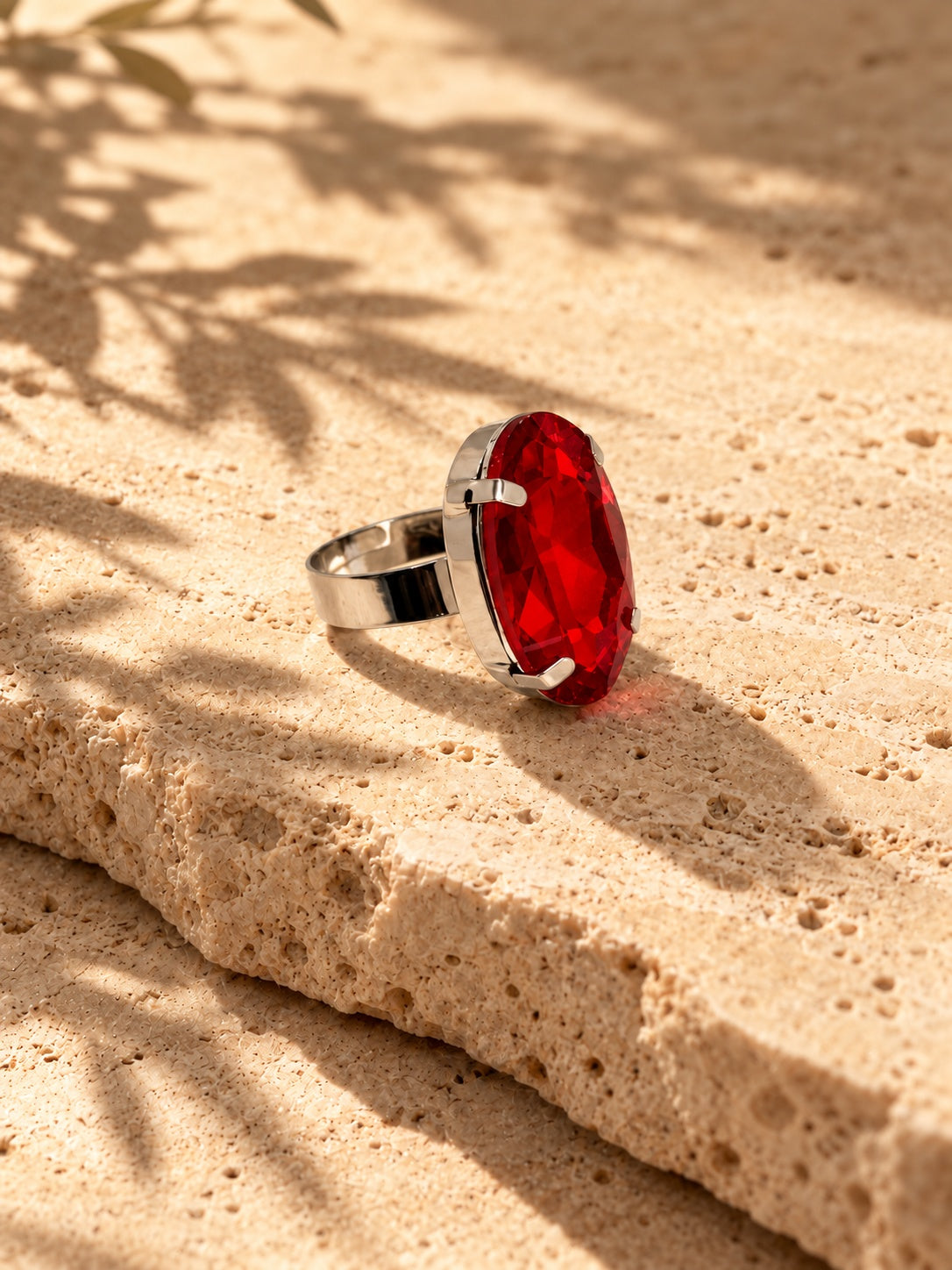 Niska red oval stone replica statement ring in a silver-tone setting