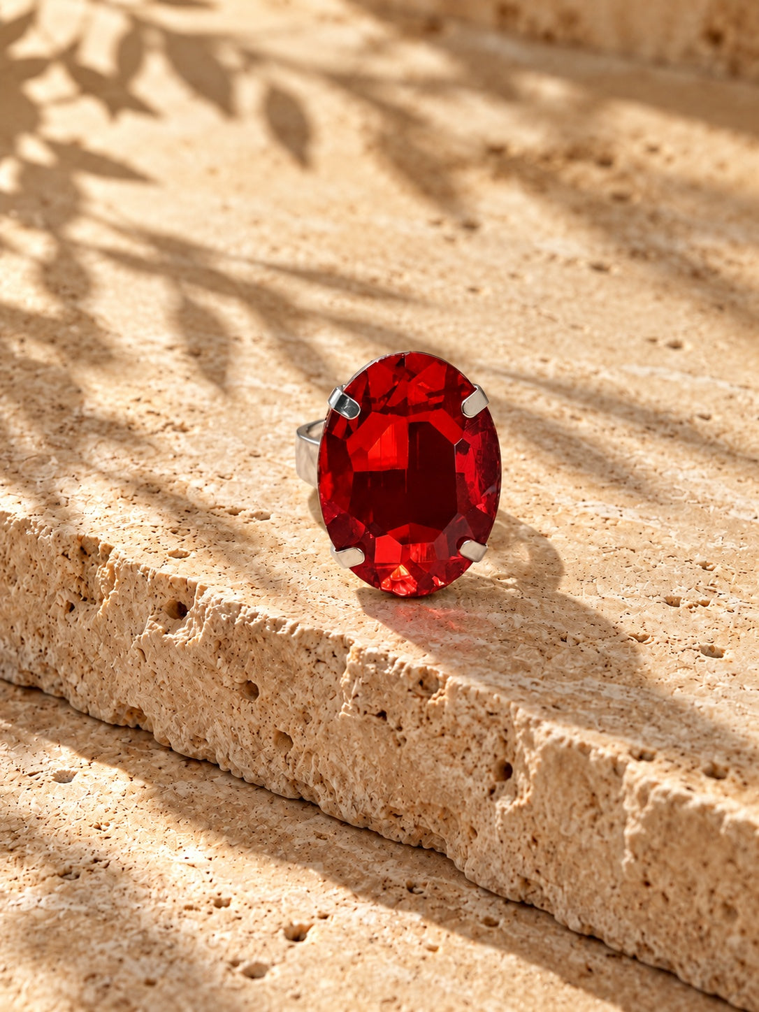 Niska red oval stone replica statement ring in a silver-tone setting