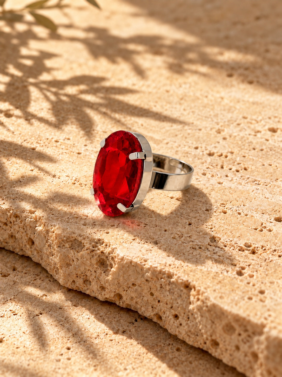 Niska red oval stone replica statement ring in a silver-tone setting