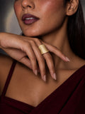 Niska gold-tone ridged statement replica ring worn on model