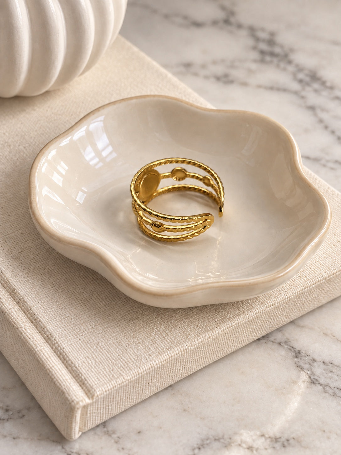 Niska Luna gold-tone white stone openwork ring — product view 1