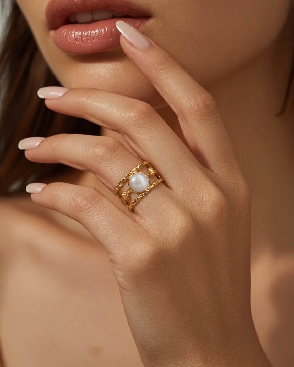 Niska Luna gold-tone white stone openwork ring — model wearing ring
