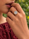 Niska round white stone gold-tone replica ring – model hand close-up
