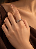 Niska silver-tone open star replica ring without stones worn on model