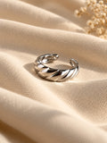 Niska silver-tone twisted band replica ring editorial view 4