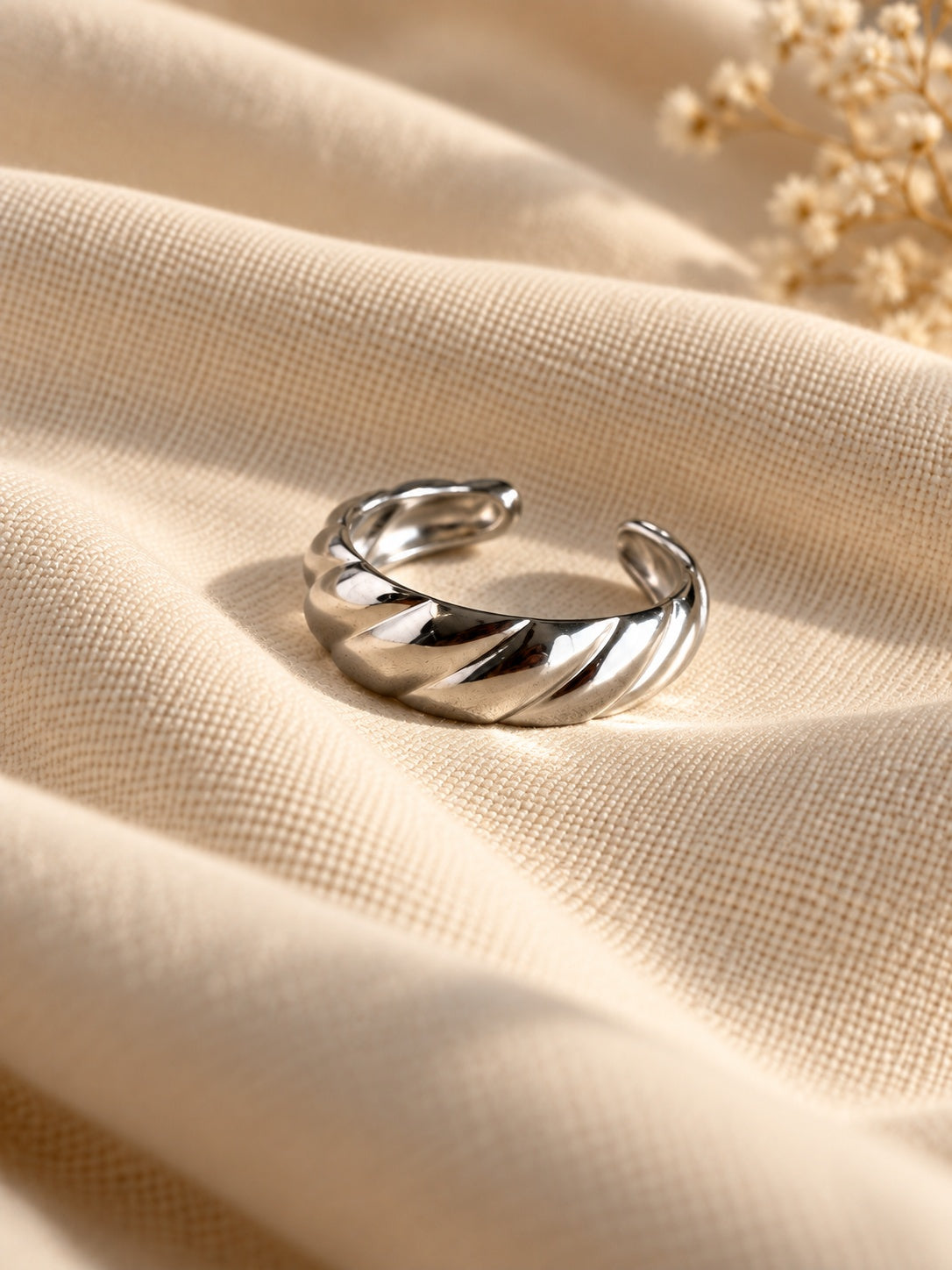 Niska silver-tone twisted band replica ring editorial view 4