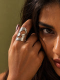 Niska statement ring worn in close-up editorial fashion portrait