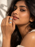 Niska statement ring worn by model in cinematic jewelry portrait