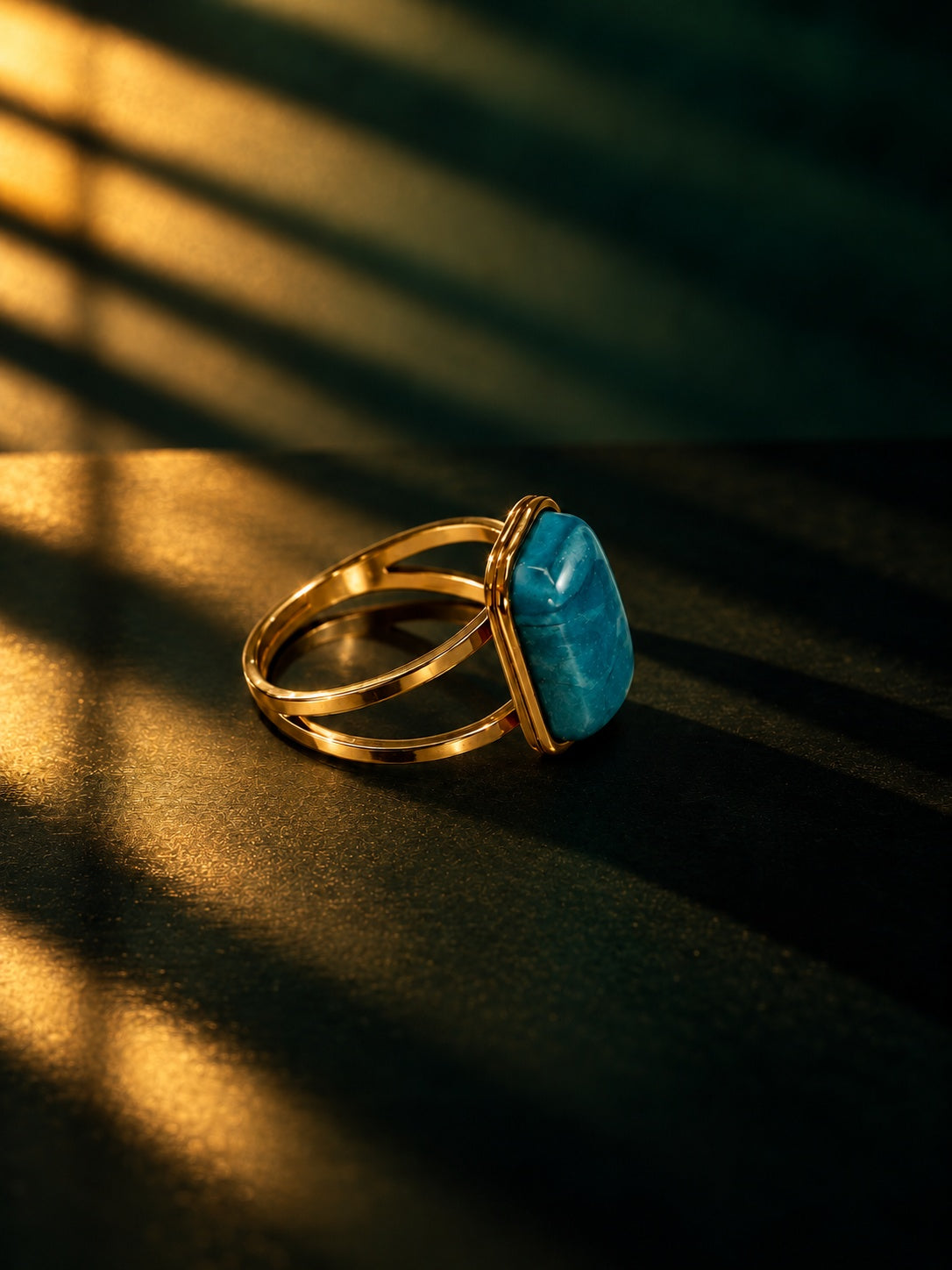 Niska blue-green cabochon statement ring with gold-tone split band