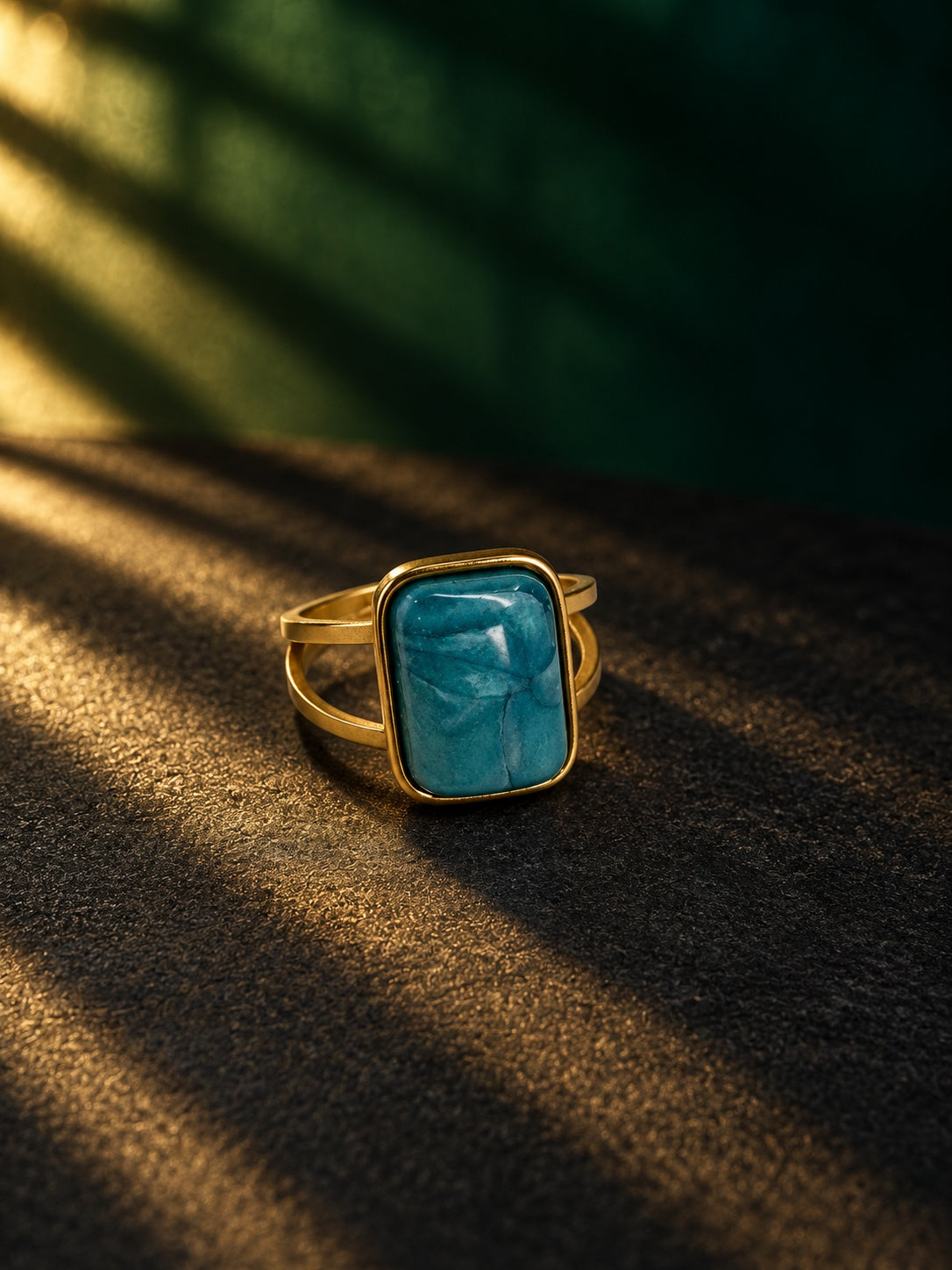 Niska blue-green cabochon statement ring with gold-tone split band