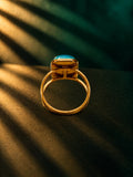 Niska blue-green cabochon statement ring with gold-tone split band