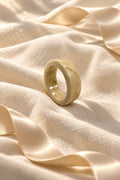 Niska marbled cream statement ring replica on ivory linen