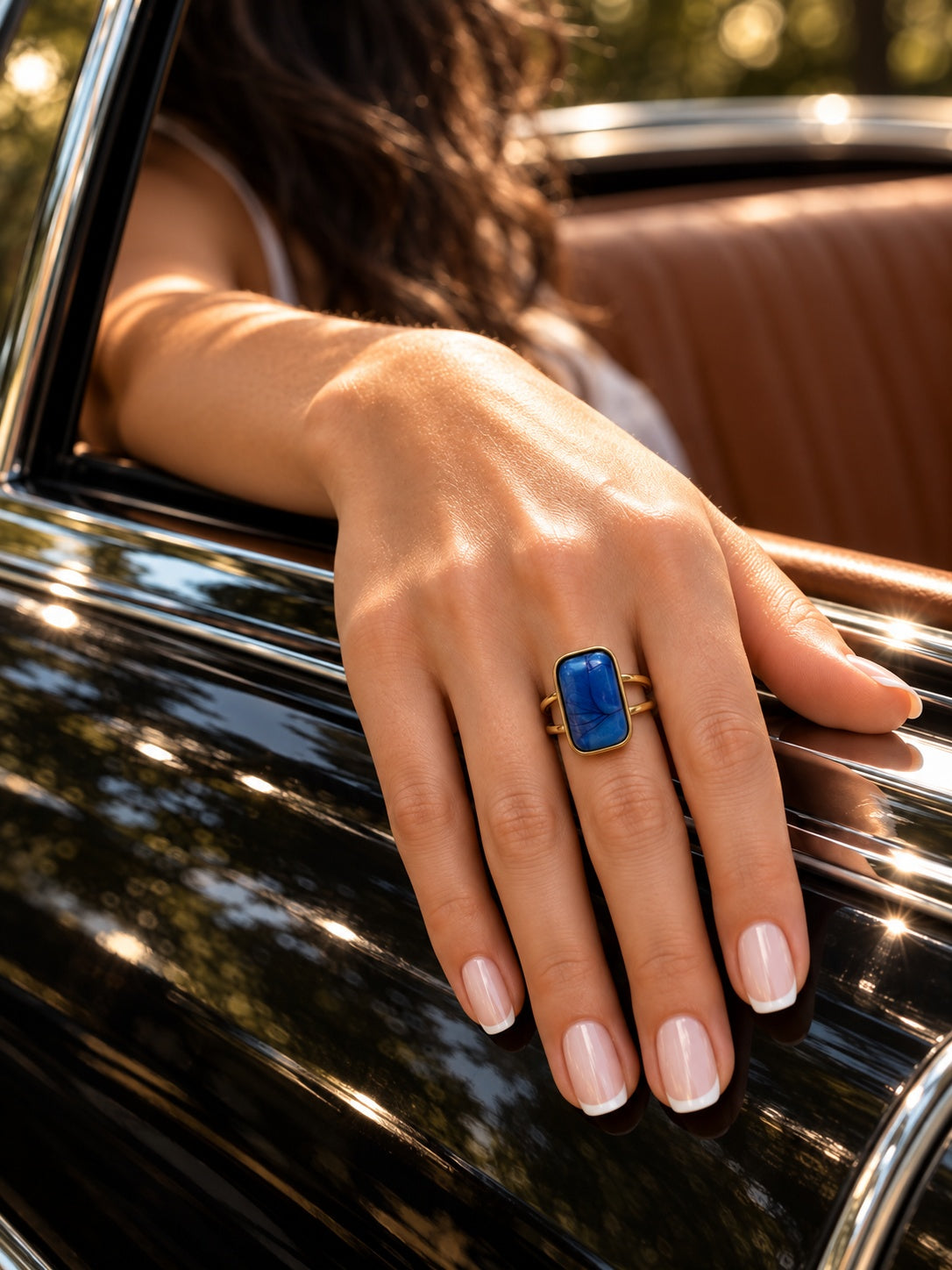 Niska cobalt blue rectangular statement ring worn on hand