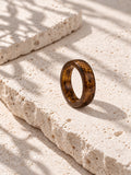 Brown and gold-tone replica band ring on ivory travertine, view 5