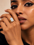 Niska white rectangular stone replica ring on model – featured image