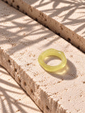 Lemon Glow Sculptural Replica Ring on travertine stone, view 6
