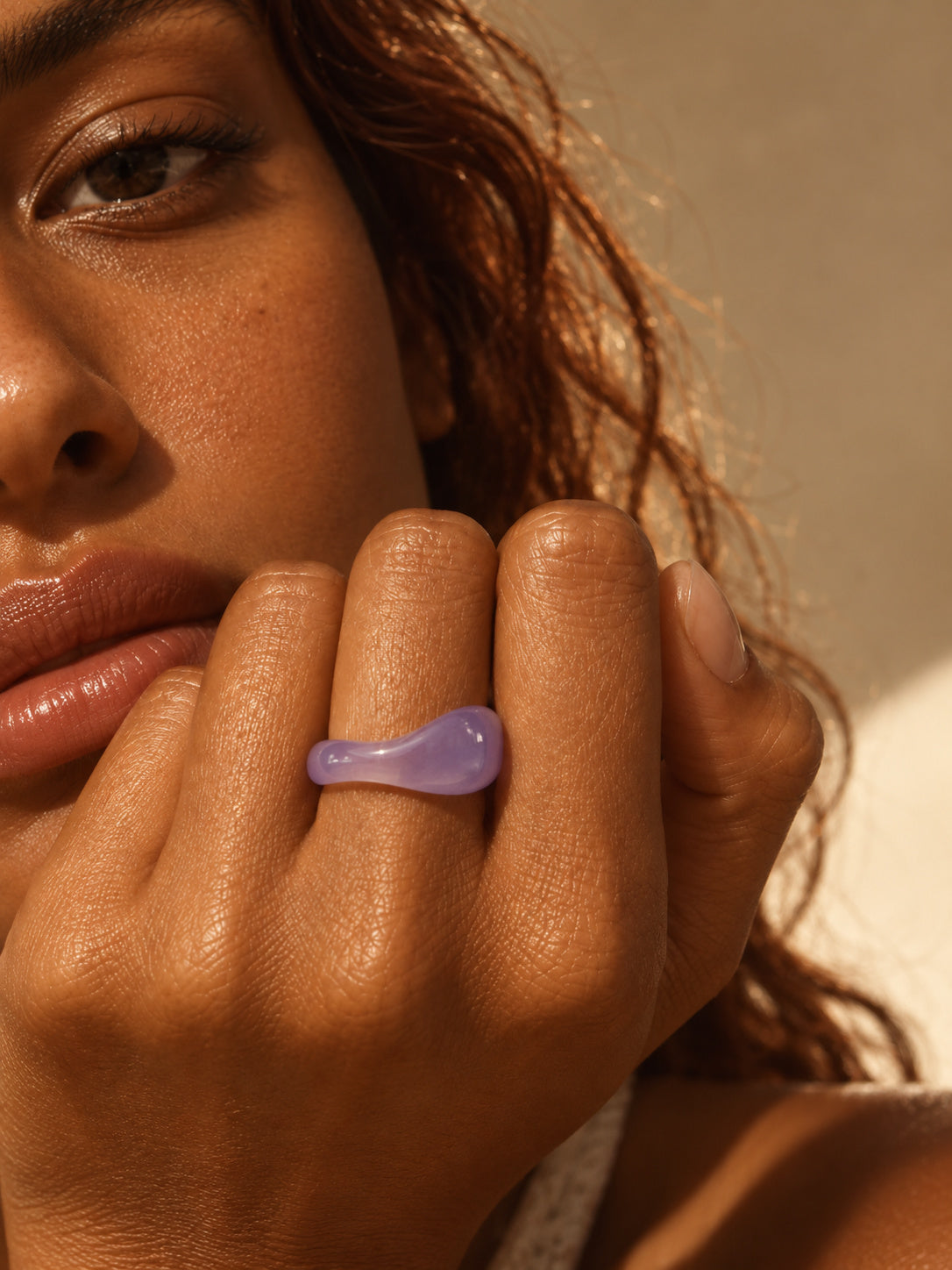 Niska lavender sculpted replica statement ring worn on a model's hand