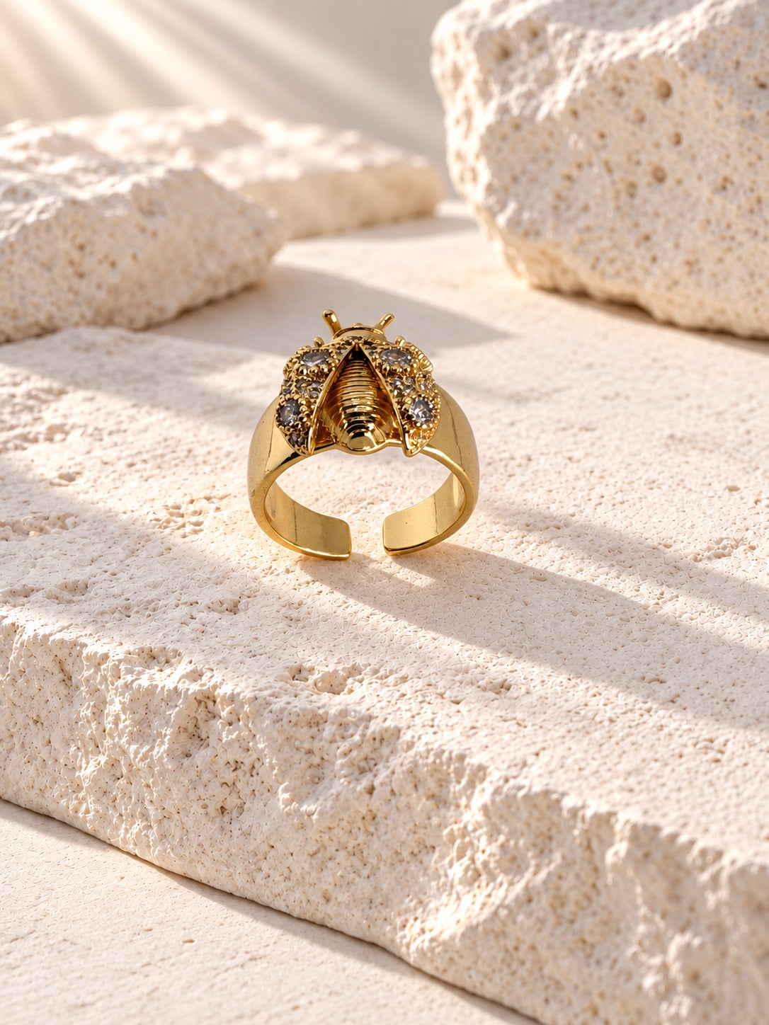 Gold insect ring open band view