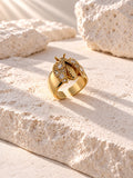 Gold insect ring three-quarter angle
