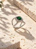 Niska green AD stone statement ring in silver-tone setting, side view