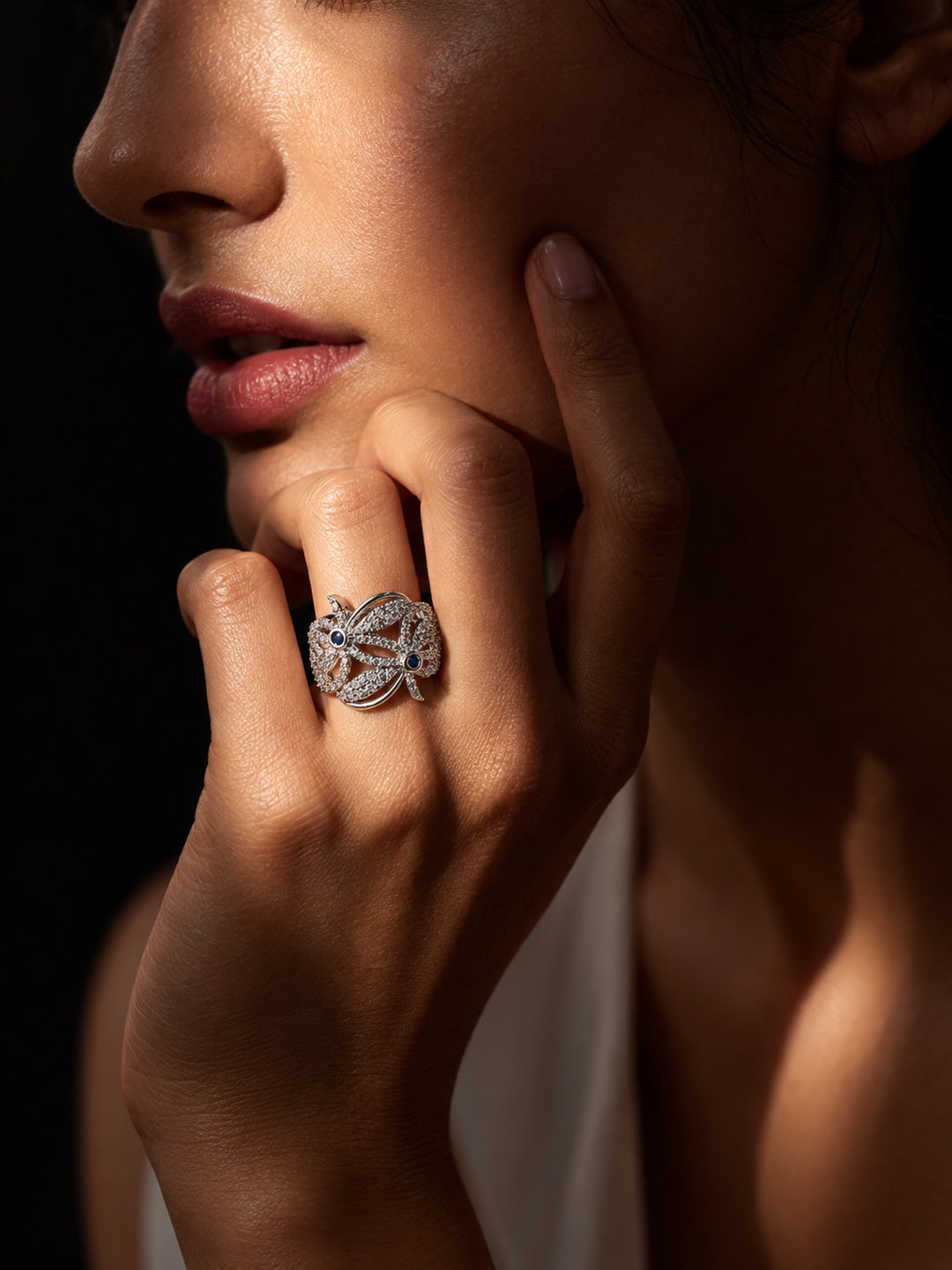Blue Blossom AD stone ring worn on model hand