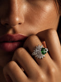 Niska green AD stone statement ring worn on hand