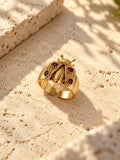 Replica gold-tone ladybug ring with burgundy stones - product angle 3