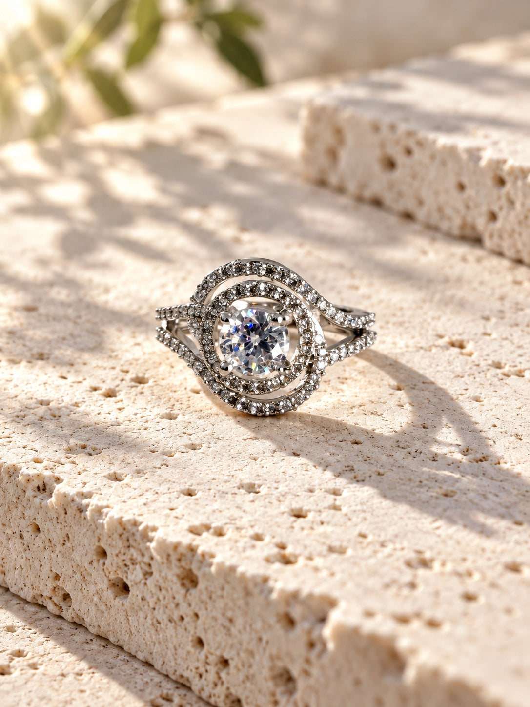 Niska silver-tone swirl AD Stone ring worn on a model's hand