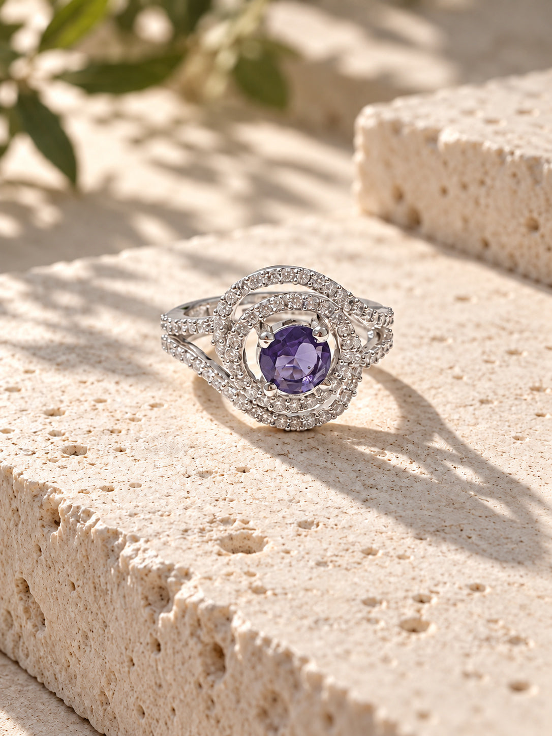 Niska violet halo AD stone statement ring worn on hand
