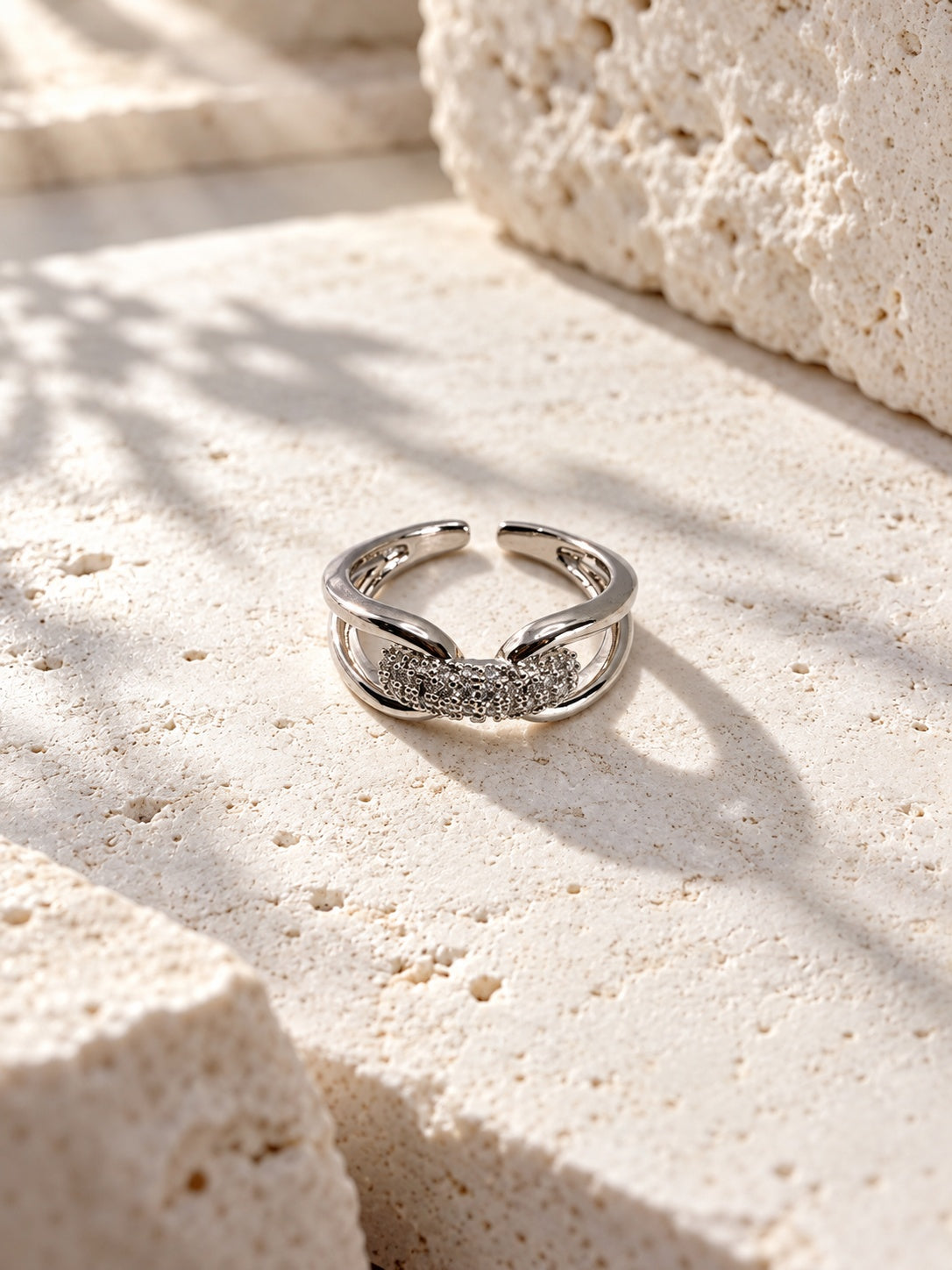 Niska silver-tone AD stone adjustable ring worn by model