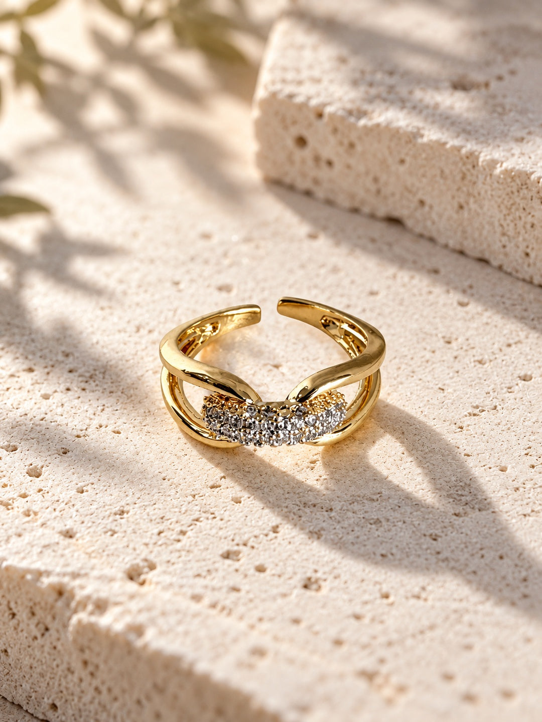 Niska gold-tone AD Stone adjustable ring worn on hand