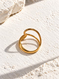 RI26N10455 gold open ring on white stone