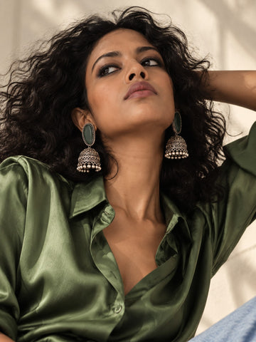 Green Monalisa Stone Silver Replica Jhumka earrings by Niska worn by a model