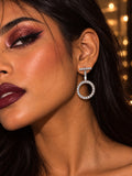 Niska AD Stone Silver replica circular drop earrings worn by model