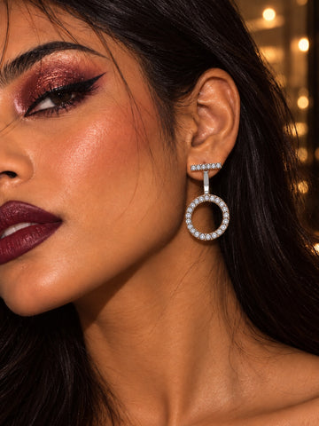 Niska AD Stone Silver replica circular drop earrings worn by model